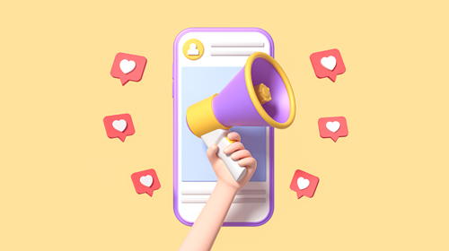 A imagem é uma ilustração. Um braço segura um megafone na frente de um celular. Ao redor estão corações.